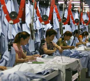 Factory workers making t-shirts