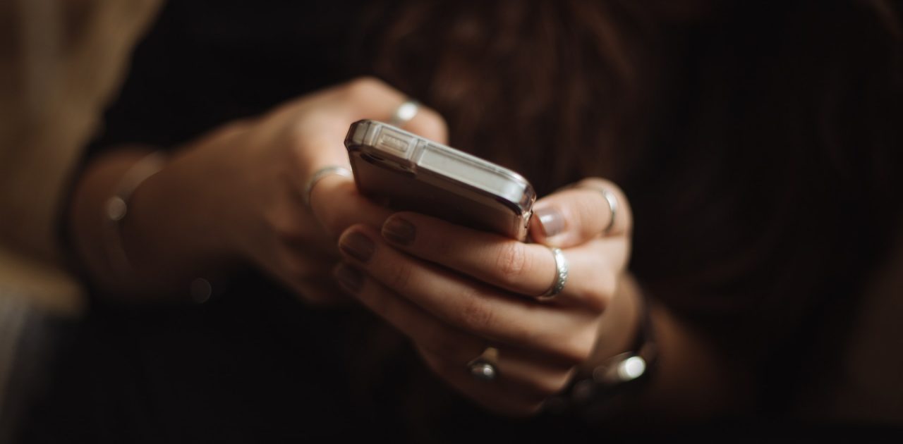 woman using smartphone